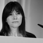 Headshot of a Woman at a Podium