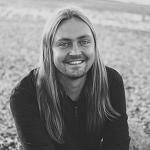 Headshot of a Man with Long Hair