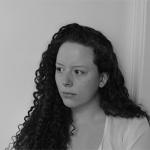 Headshot of a Woman with Curly Hair