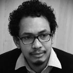 Headshot of a Man with Curly Hair