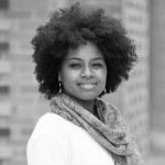 Headshot of a Woman with Curly Hair