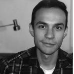 Headshot of a Man in a Plaid Shirt