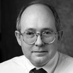 Headshot of a Man with Glasses